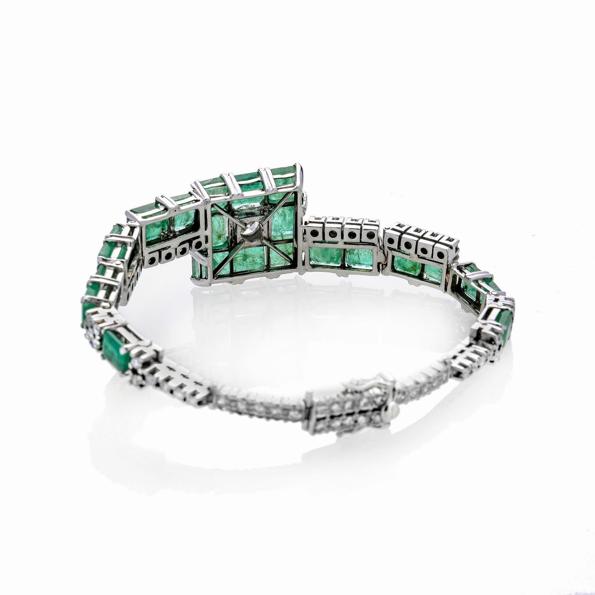 Bracciale in oro bianco 18 kt, diamanti e smeraldi