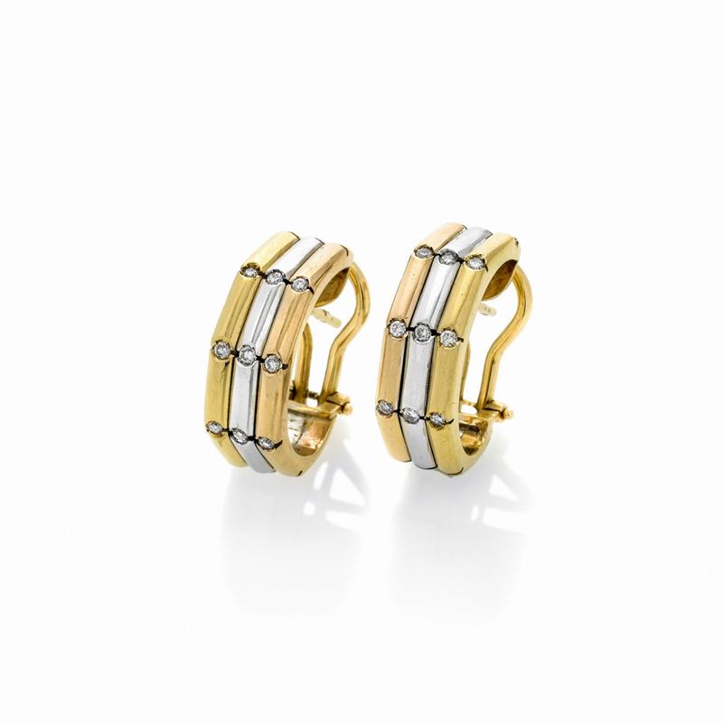 Paio di orecchini in oro rosa, giallo, bianco 18 kt e diamanti