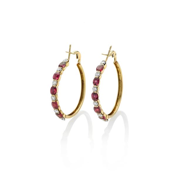 Large hoop earrings in 18kt yellow gold, diamonds and rubies