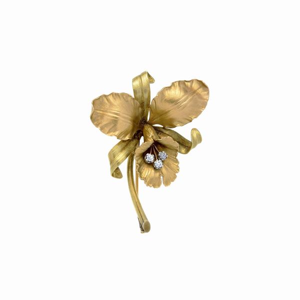 Grande spilla Orchidea  in oro giallo 18 kt e diamanti