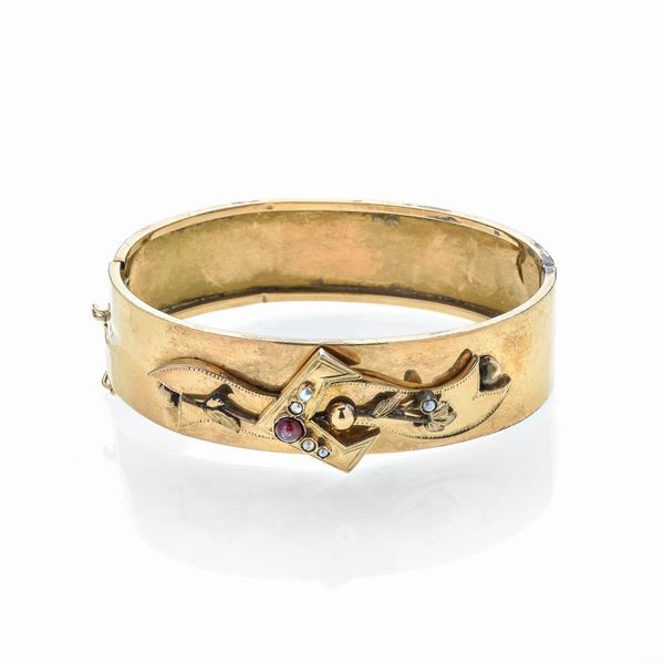 Bracciale rigido in oro18 kt e microperle