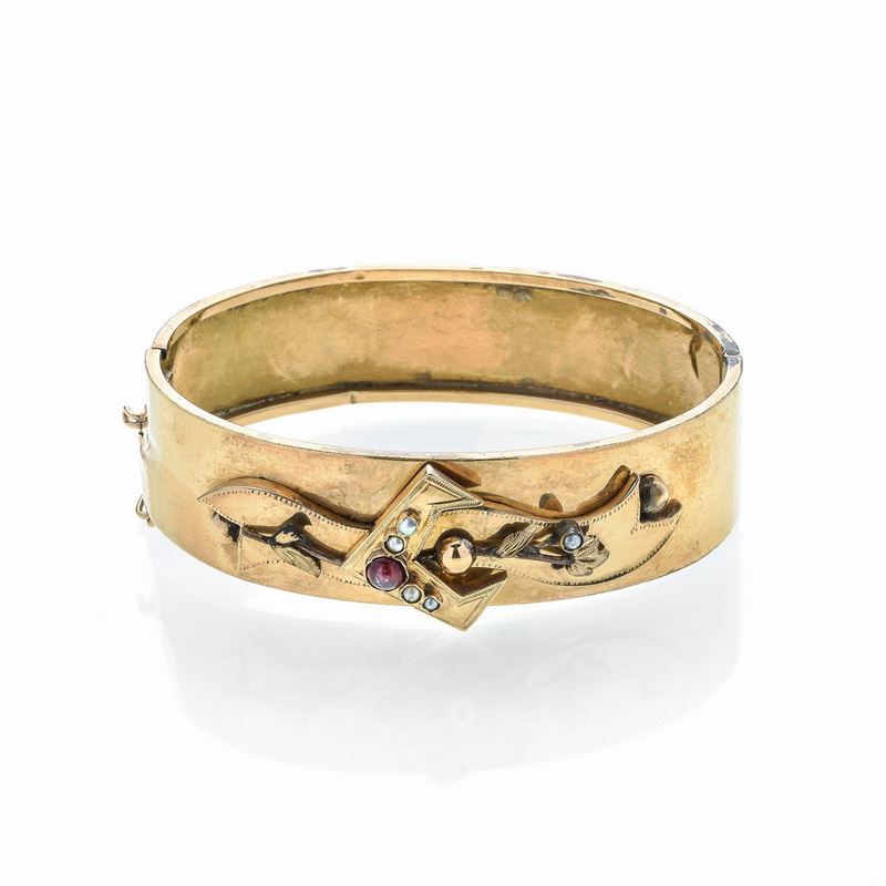 Bracciale rigido in oro18 kt e microperle
