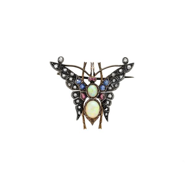 Butterfly brooch in 9 kt gold, silver, diamonds, sapphires, rubies and opal