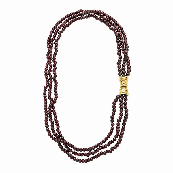 Necklace in garnet and 18 kt yellow gold