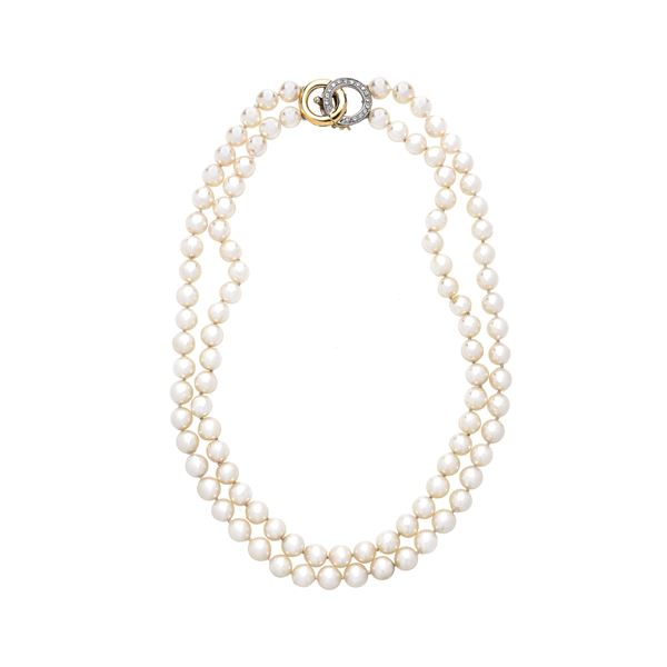 Necklace in cultured pearls, 18 kt yellow gold, white gold and diamonds