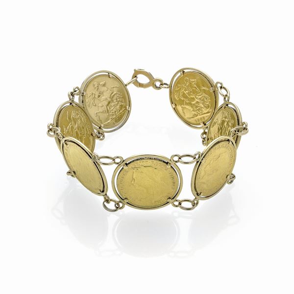 Bracciale in oro giallo 18 kt con sette  sterline