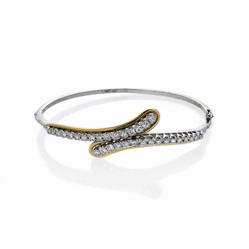Bracciale rigido in oro giallo e oro bianco 18 kt e diamanti