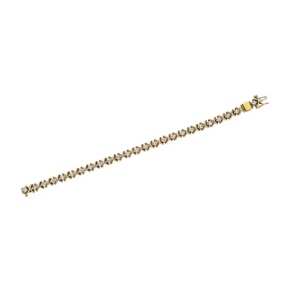 Bracelet in 14kt yellow gold and diamonds