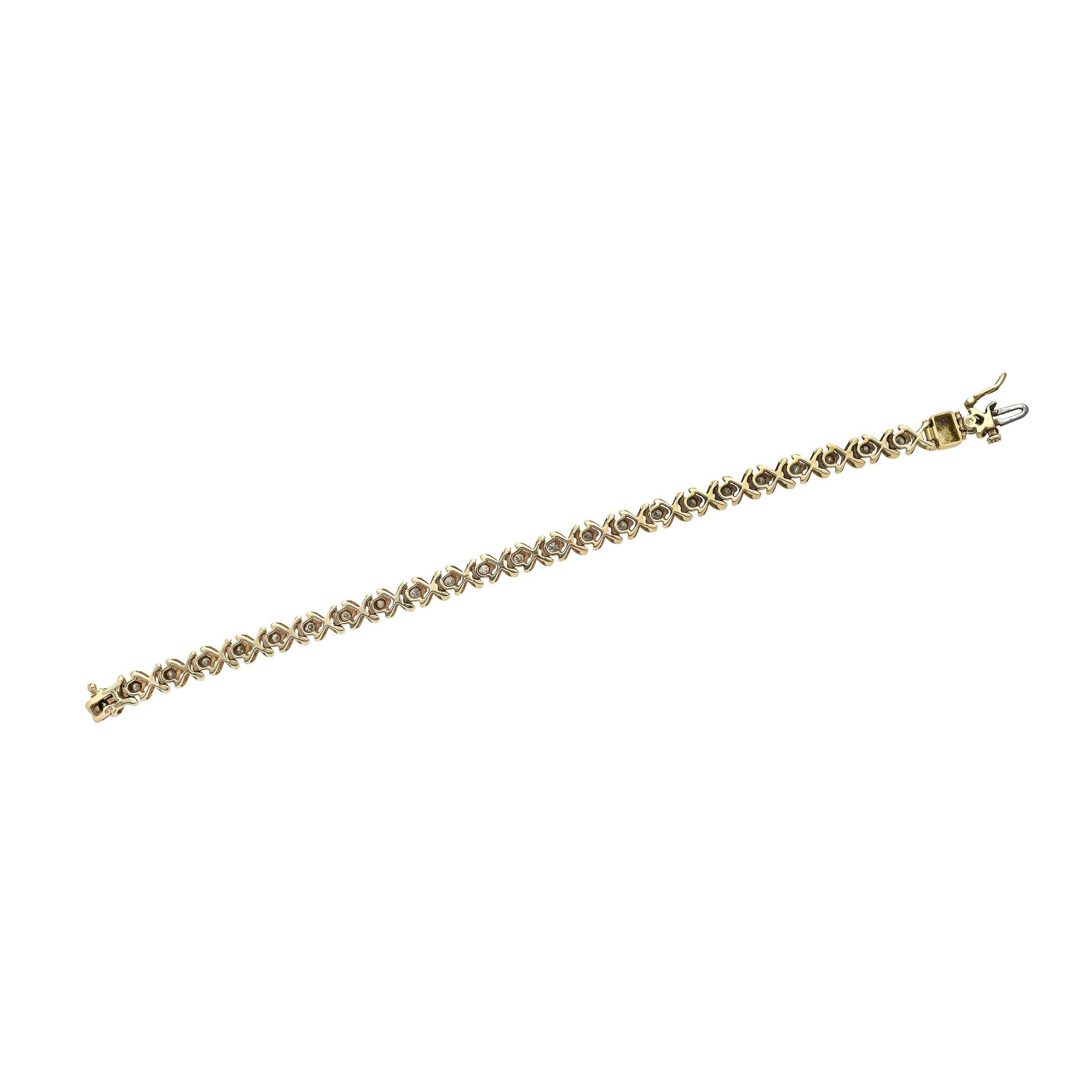 Bracciale in oro giallo 14kt e diamanti