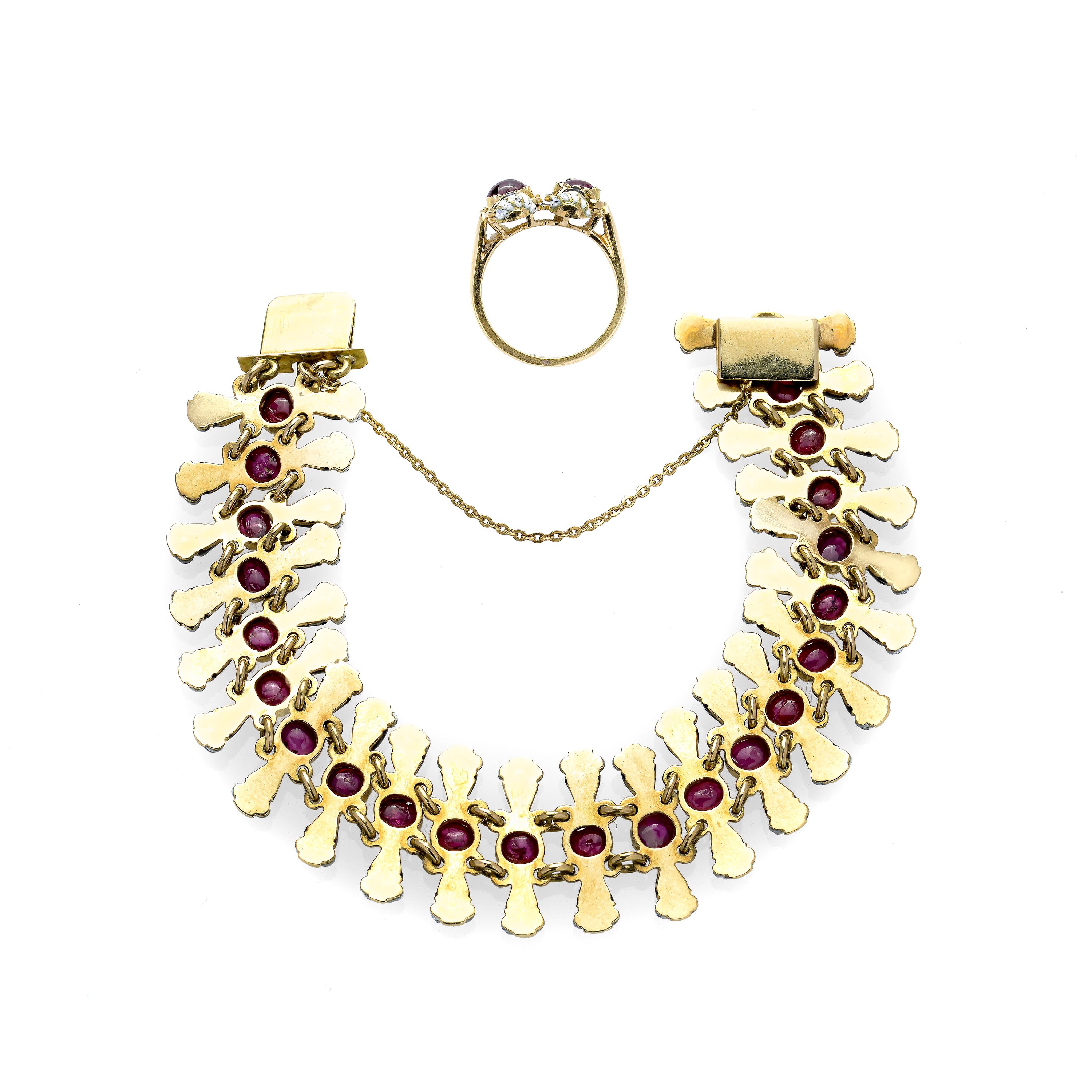 Bracciale e anello "Moretti" in oro giallo 18 kt, rubini e smalti nei toni del bianco e nero