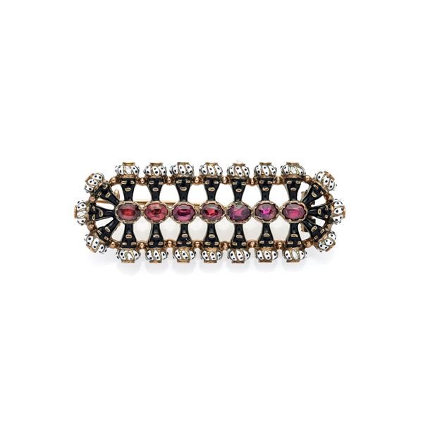 "Moretti" bar brooch in yellow gold, garnet and enamels in shades of black and white