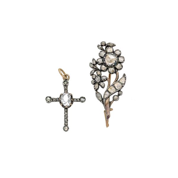 Floral brooch and cross in low title gold, silver and diamond roses