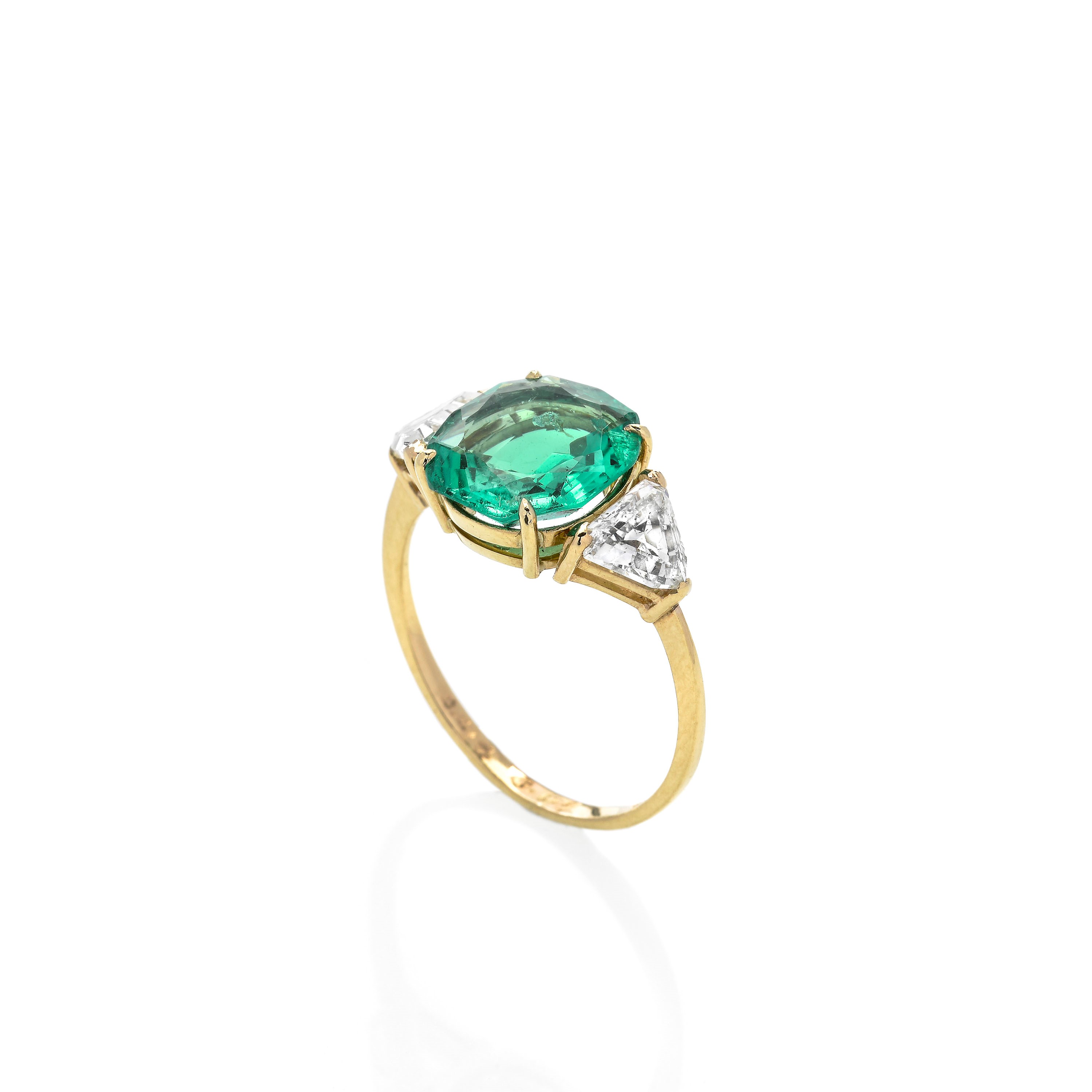 Anello in oro giallo, diamanti e smeraldo Colombiano