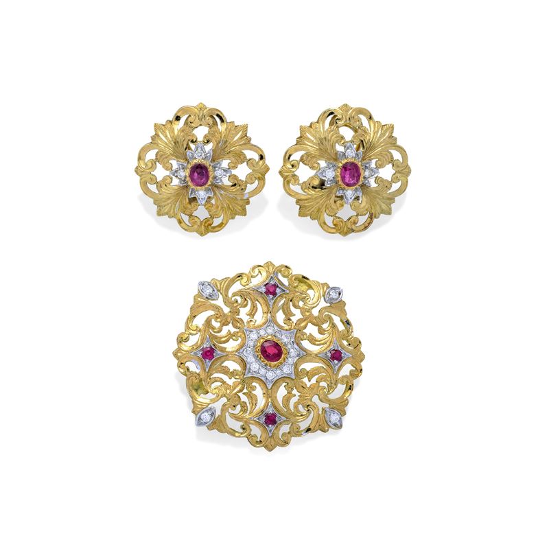 PAOLO PENCO Parure di ispirazIone floreale in oro bianco, giallo, diamanti e rubini
