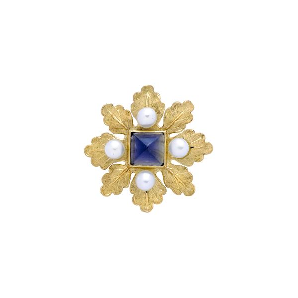 PAOLO PENCO  Floral-inspired brooch in yellow gold, pearls and dark blue Iolite