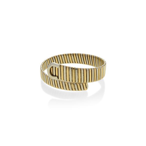 Semi-rigid contrariè bracelet in white gold and yellow gold