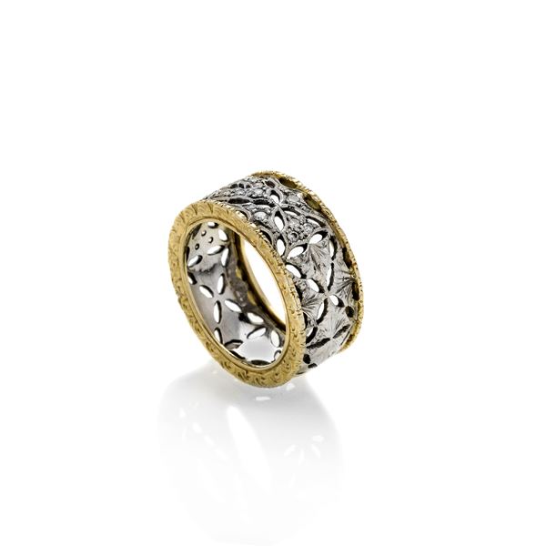 Anello a fascia in oro bianco, oro giallo e diamanti