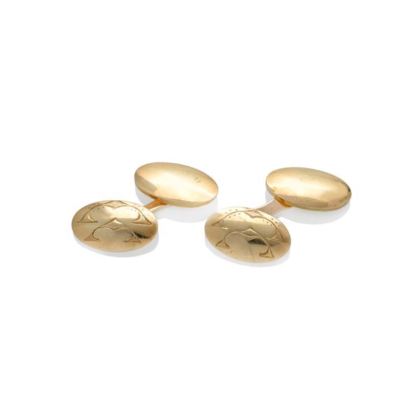 Pair of  yellow gold oval cufflinks