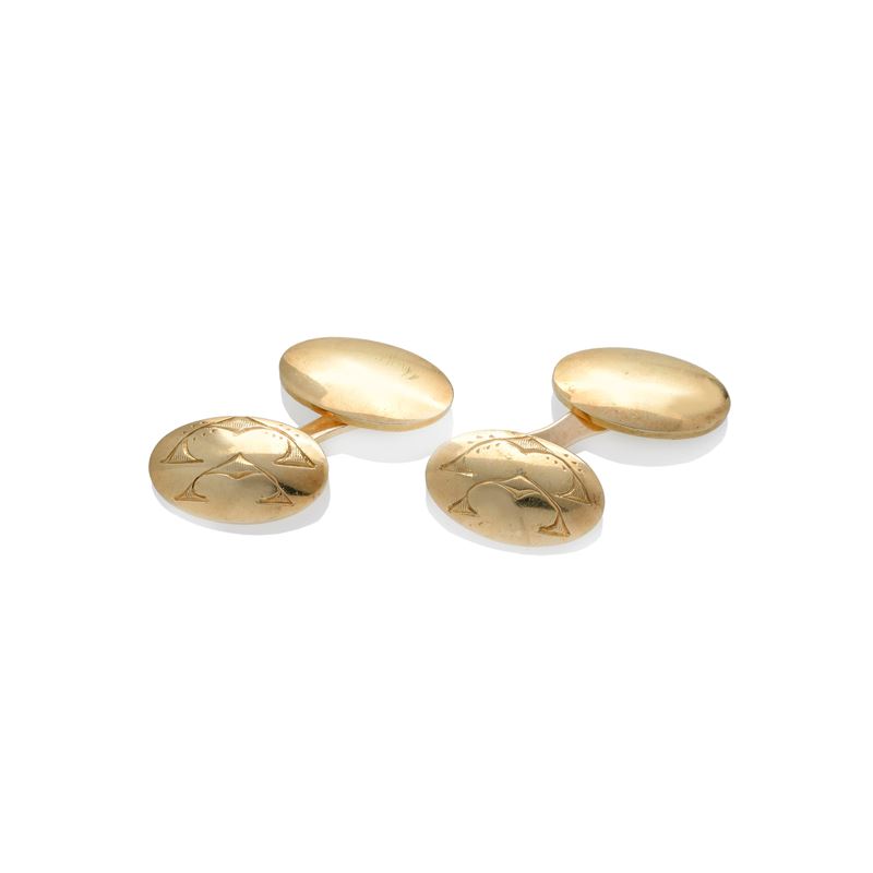 Paio di gemelli ovali in oro giallo
