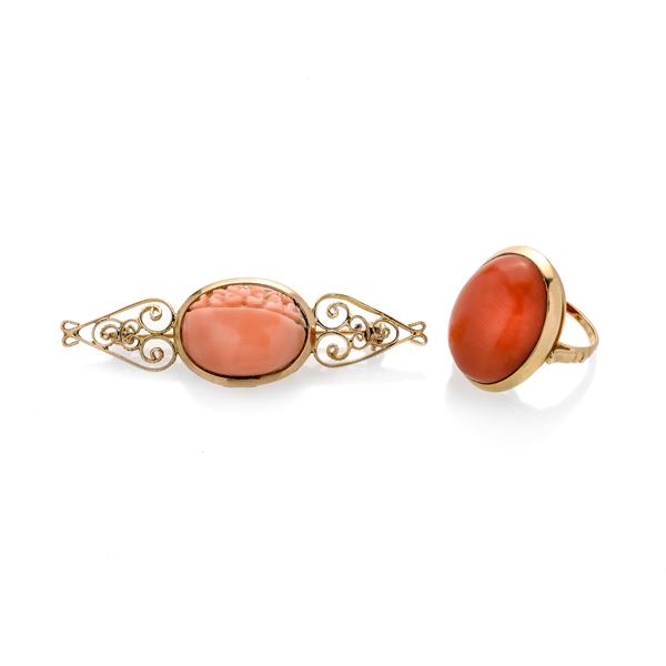 Yellow gold and pink coral bar brooch and yellow gold and red coral ring