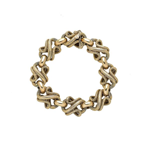 Yellow gold and yellow gold engraved intertwined link bracelet