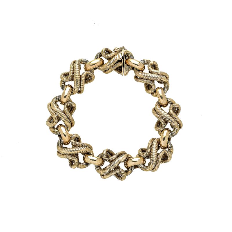 Braccialetto in oro giallo e oro giallo inciso a maglie intrecciate