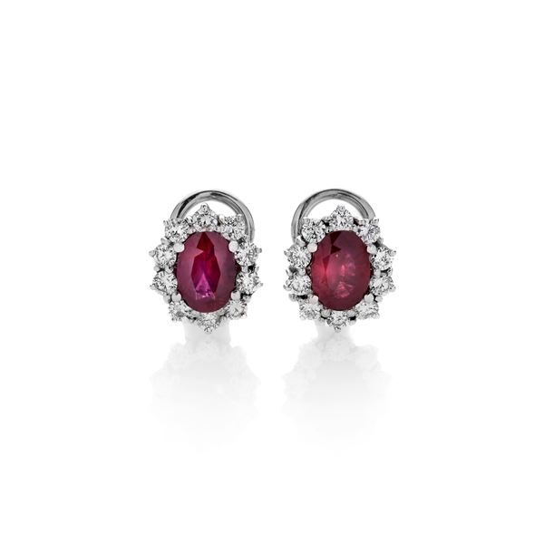 Pair of daisy earrings in white gold, diamonds and rubies