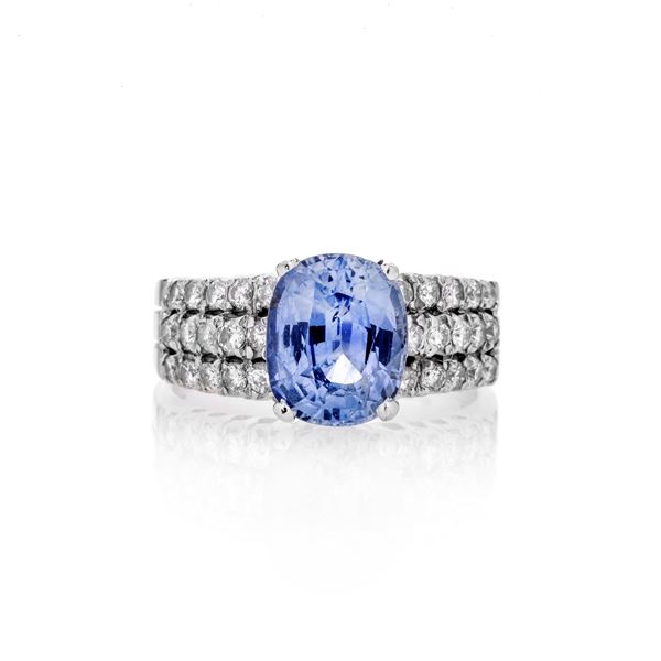 Band ring in white gold, diamonds and Ceylon sapphire