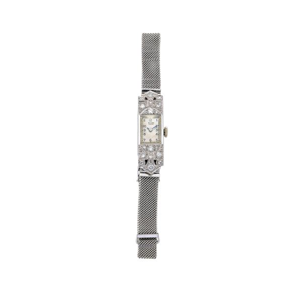Lady's watch in platinum, 9 kt gold and diamonds