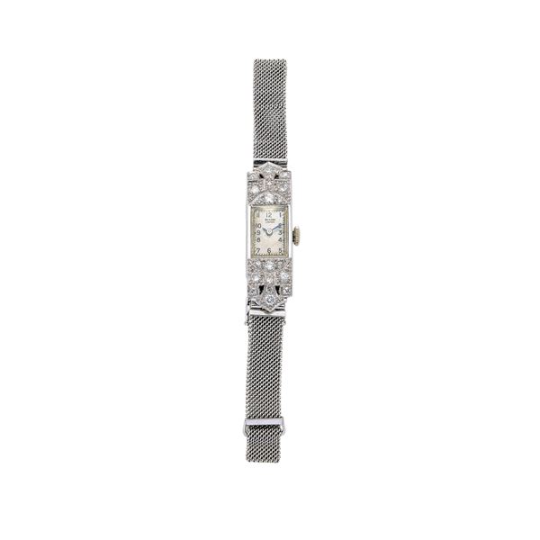 Orologio da signora in platino, oro 9 kt e diamanti