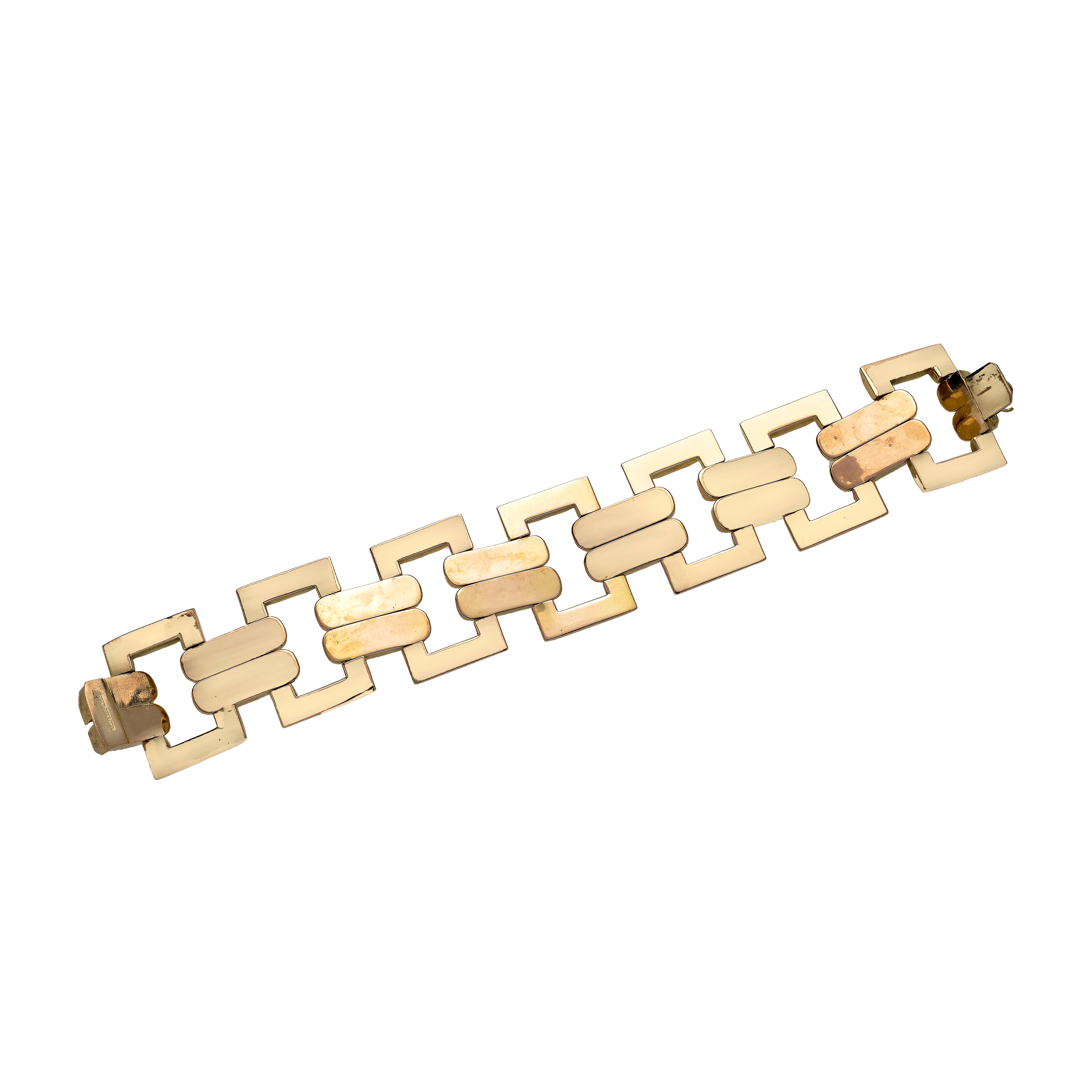 Alto bracciale di ispirazione geometrica in oro giallo