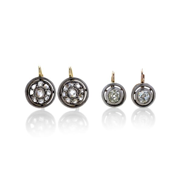 Pair of low gold, silver and diamond hook earrings and another pair with diamond roses