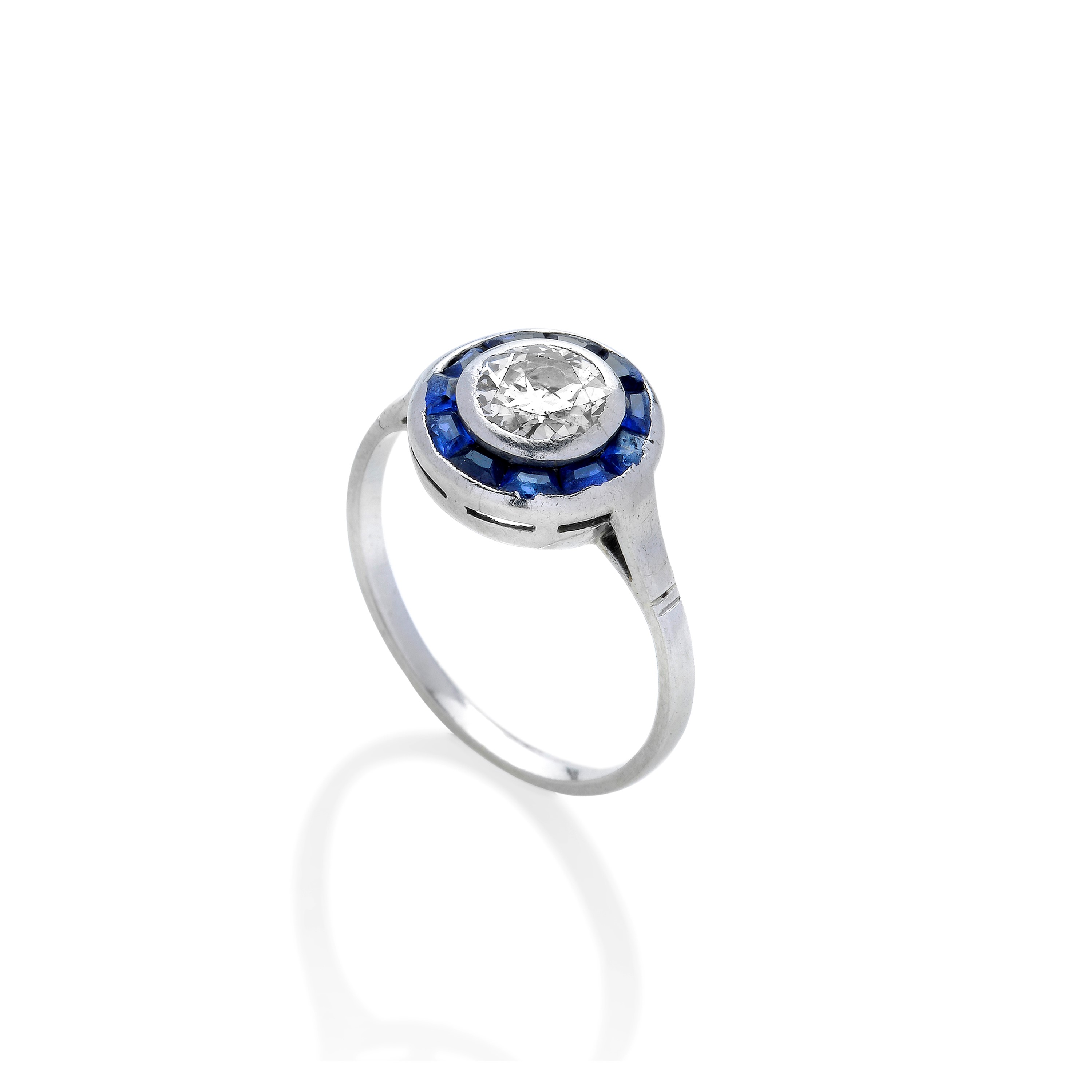 Anello solitario in platino, zaffiri e diamante