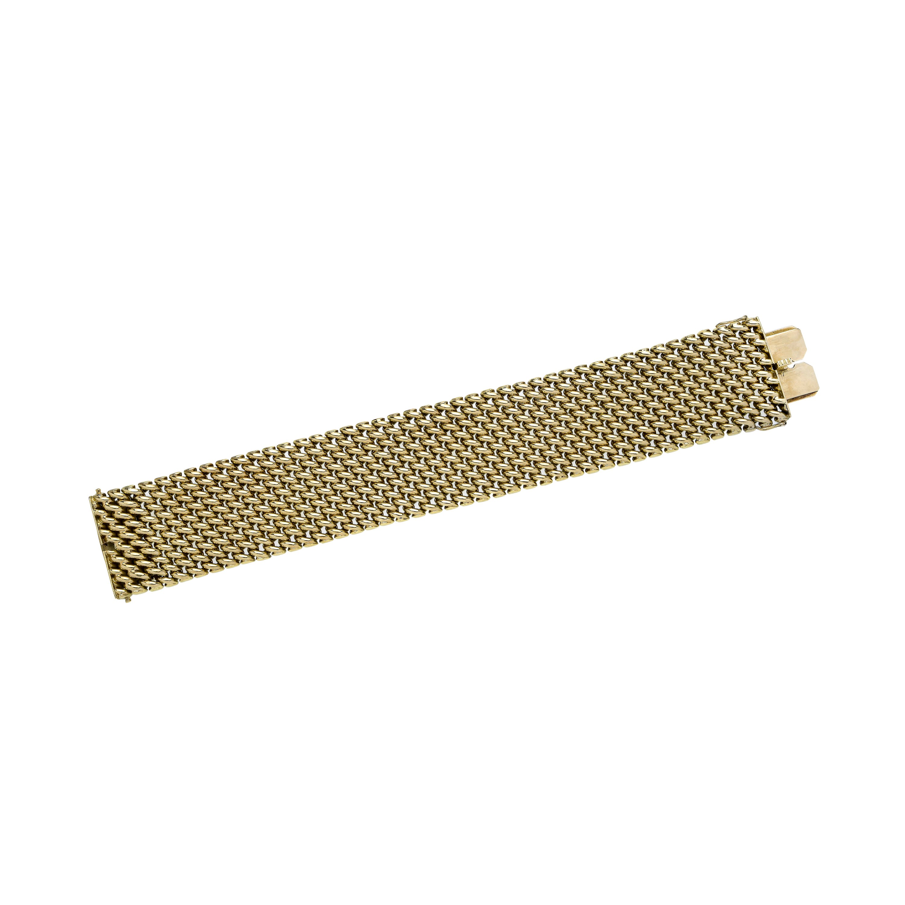 Alto bracciale in oro giallo ad imitazione del tessuto