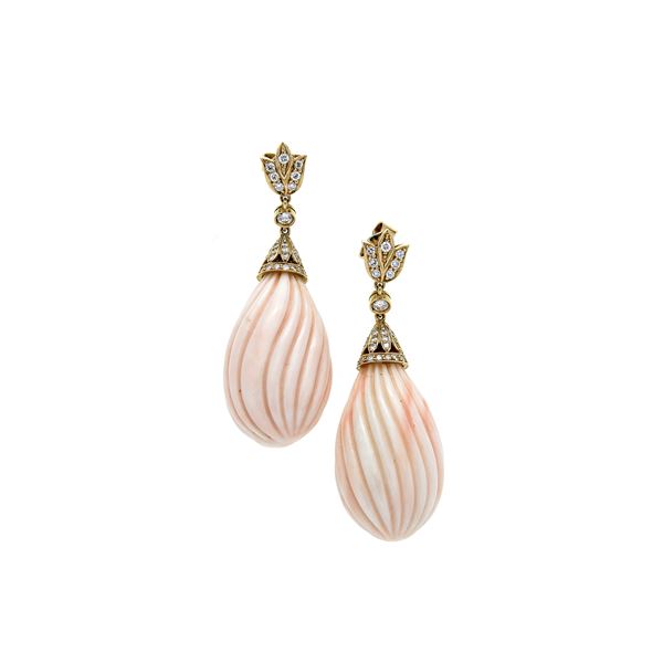 Pair of pendant earrings in yellow gold, diamonds and angel skin coral