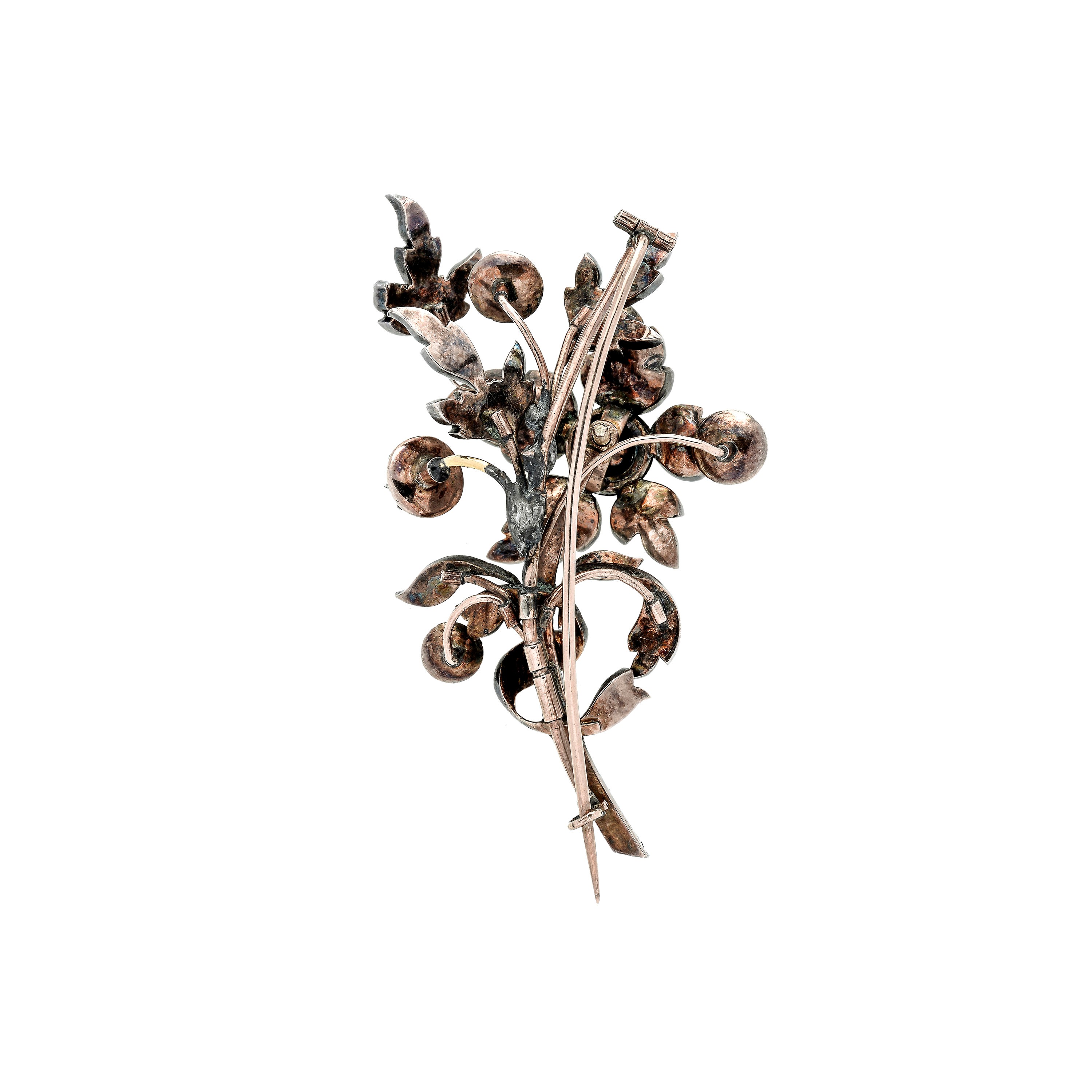 Spilla Fiore in oro a basso titolo, argento e diamanti