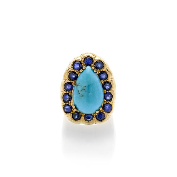 Large ring in yellow gold, sapphires and turquoise