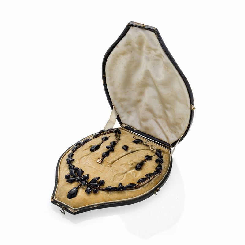 Parure in oro a basso titolo e onice