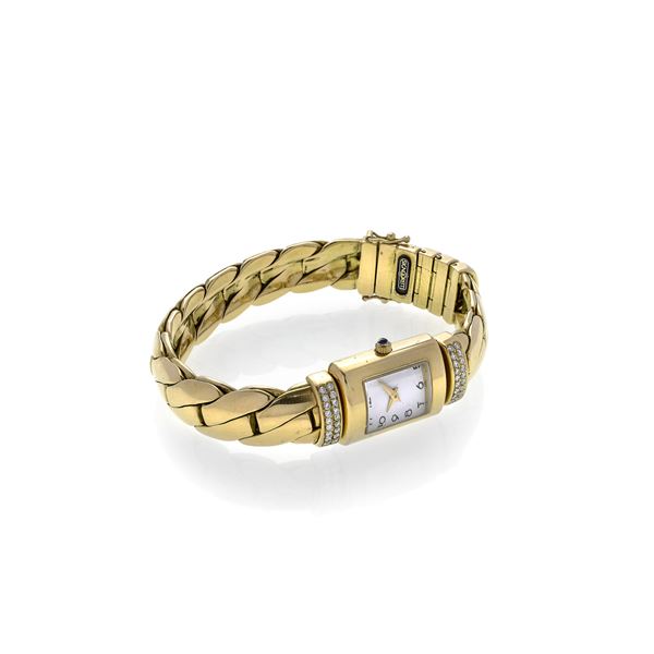 Wristwatch in 18 kt yellow gold and diamonds