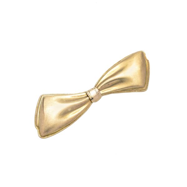 Large Fiocco brooch in satin-finish yellow gold