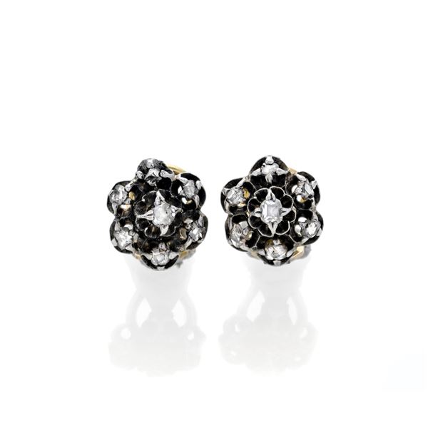 Pair of "Fiori" clip earrings in yellow gold, silver and diamonds