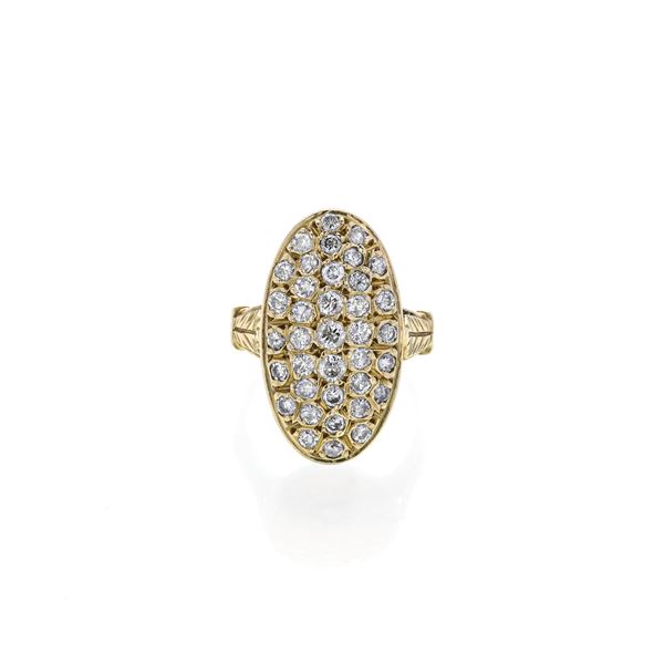 Oval shield ring in yellow gold and diamonds