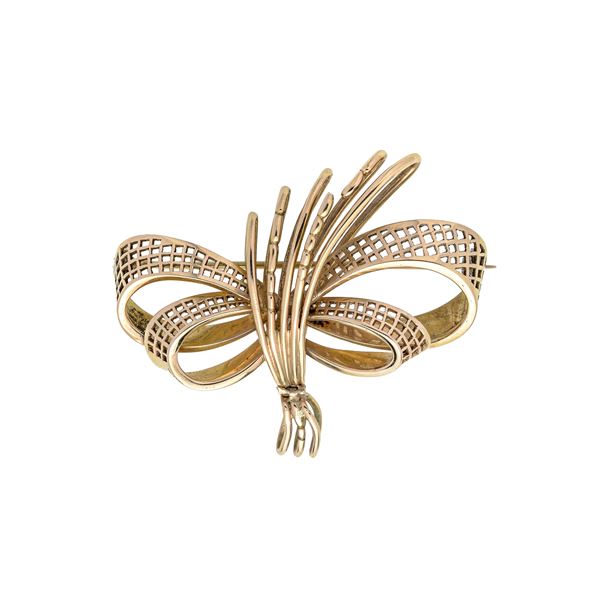 Large Fiocco brooch in yellow gold