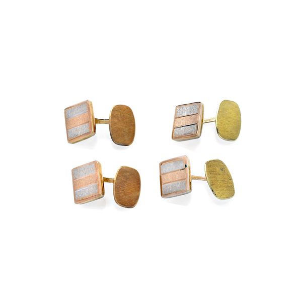 Due paia di gemelli in oro giallo, oro rosa e oro bianco