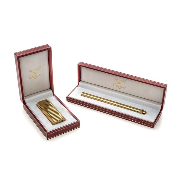 CARTIER - Penna e accendino Le Must de Cartier placcati in oro