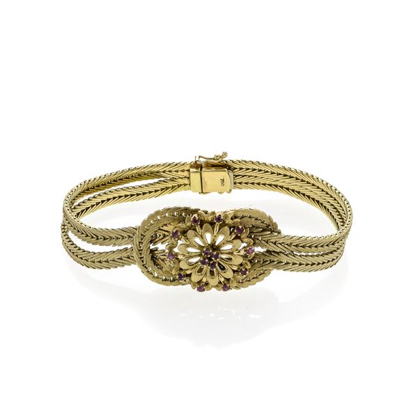 Floral bracelet in yellow gold and rubies