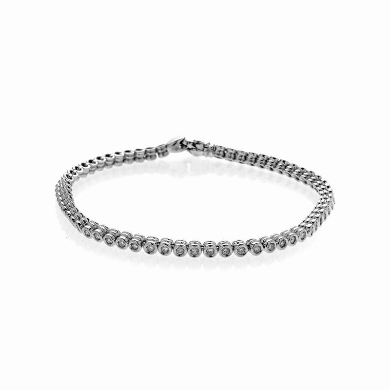 Bracciale tennis in oro bianco e diamanti