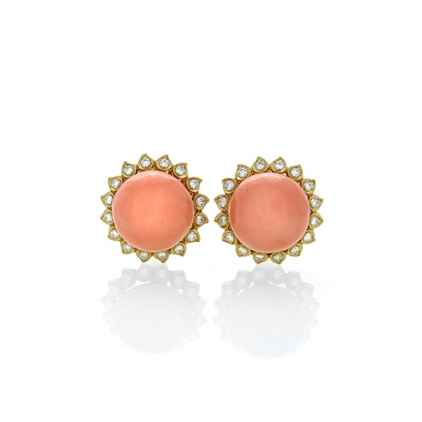 Pair of large earrings in yellow gold, diamonds and pink coral