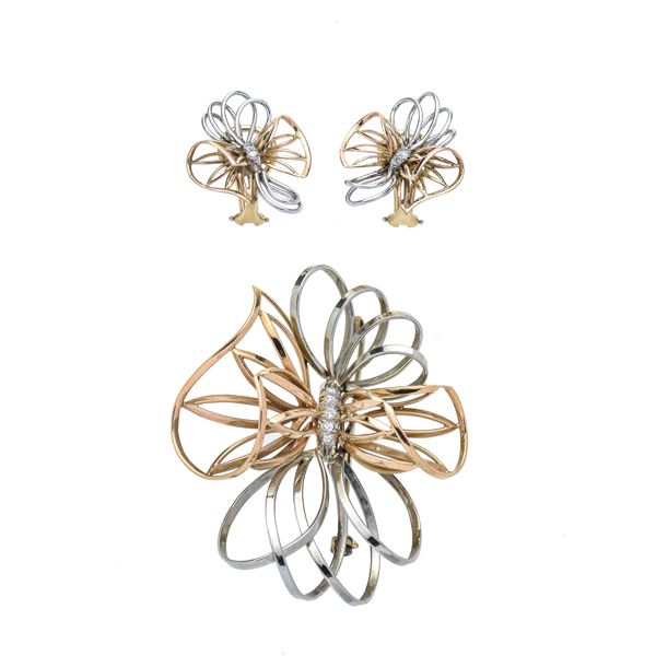 Pair of earrings and large floral-inspired brooch in yellow gold, white gold and diamonds
