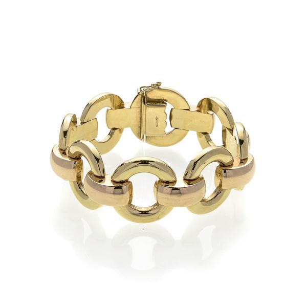 Alto bracciale in oro giallo e oro rosa